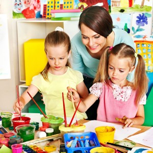 Mother and daughter drawing together